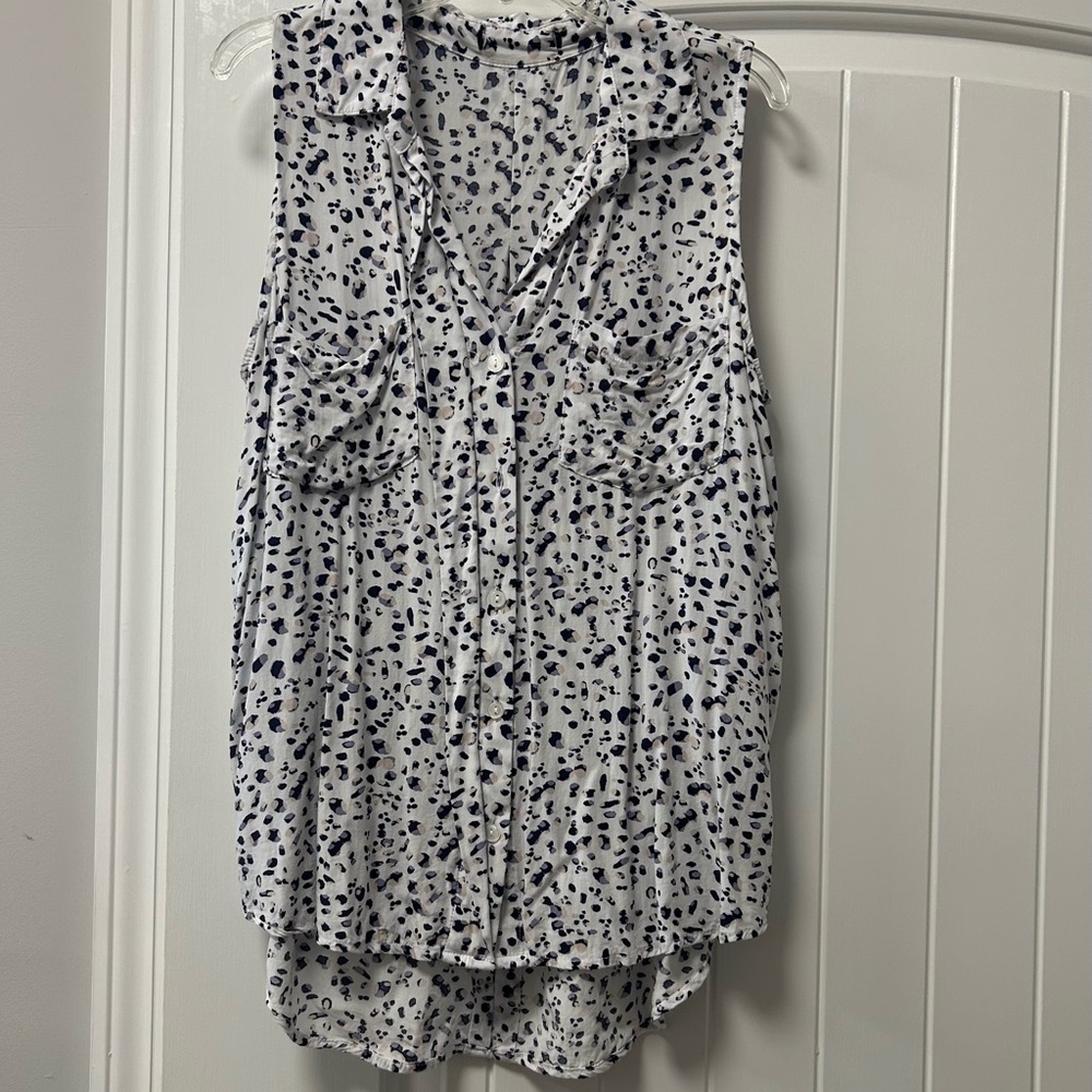 Sleeveless White and Black Blouse